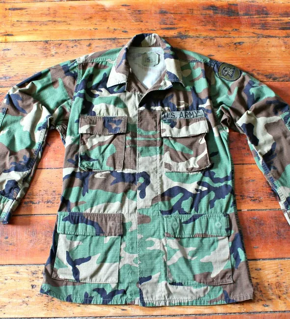 ‘Power to the peaceful’ vintage military camo jacket