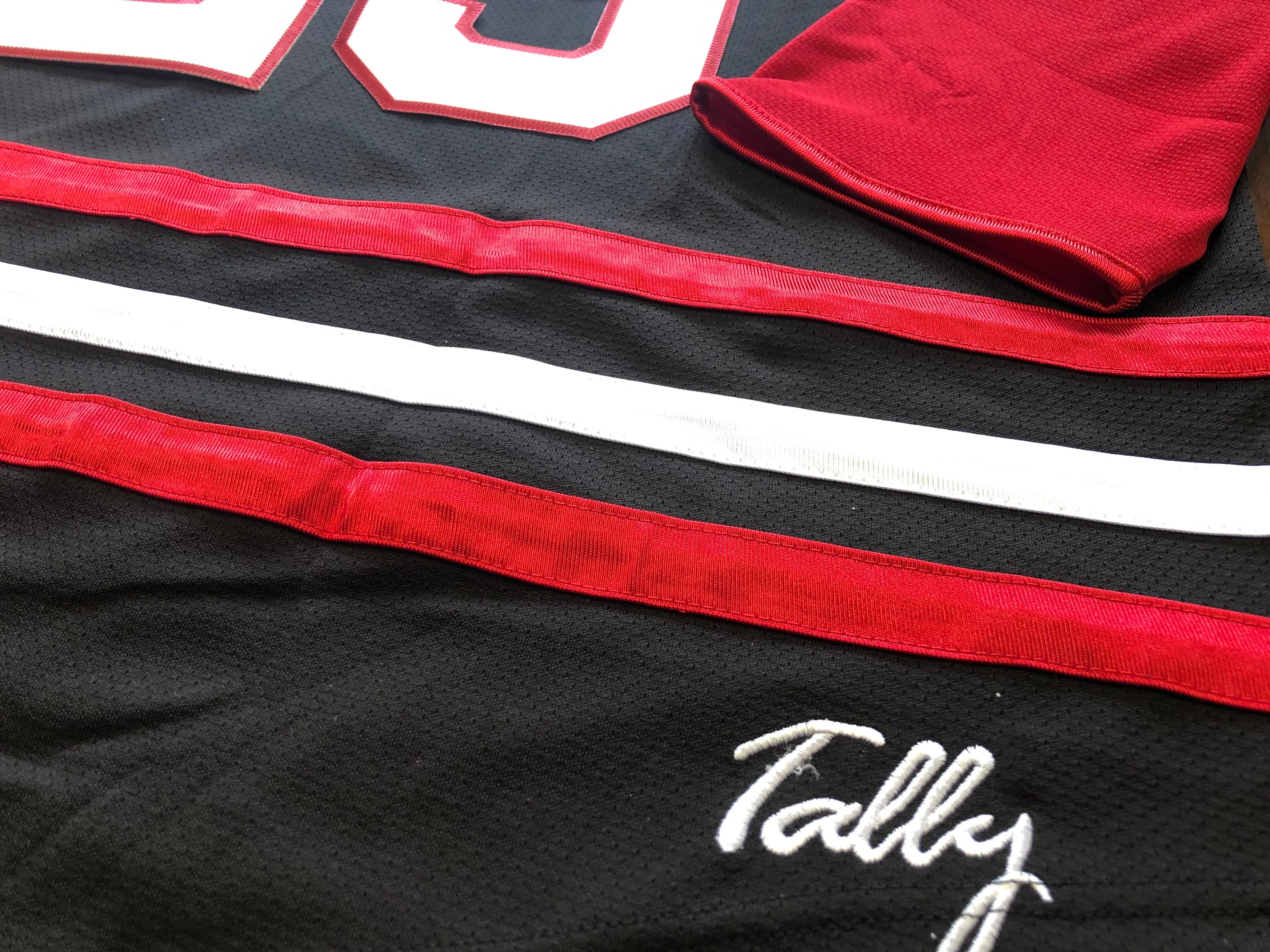 Custom Hockey Jerseys with a Blackhawk Logo and Shoulder Patches